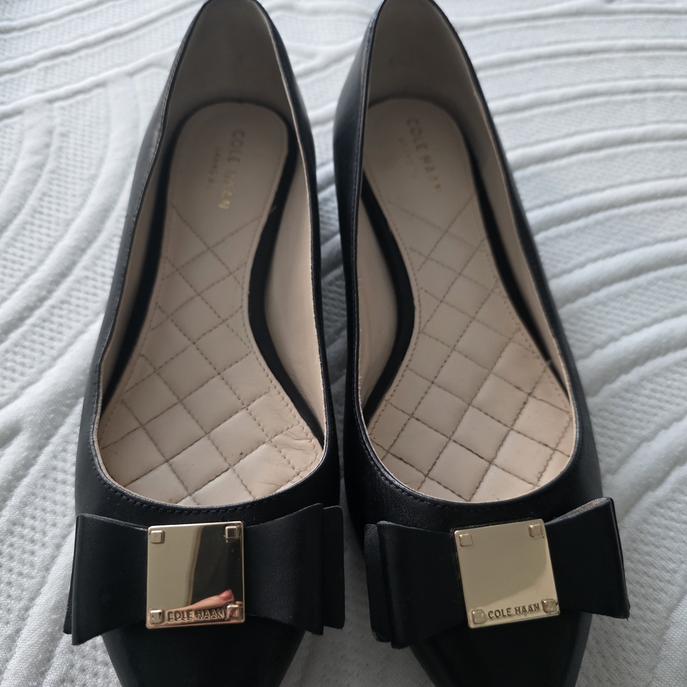 Cole Haan Tali Bow Modern Black Flats with Gold Accents